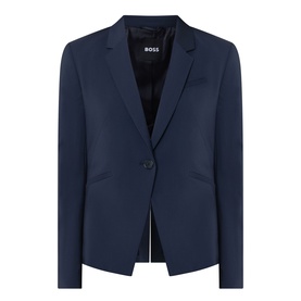 Hugo Boss dark blue single-button wool blazer with notch lapels, welt pockets, and partial lining visible at hem
