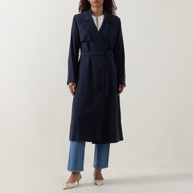 Model wearing Hugo Boss dark blue viscose wrap coat with tie belt, styled with blue wide-leg jeans and cream heels