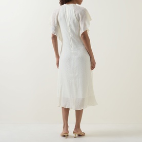 Model wearing Hugo Boss Optic Beige midi dress, back view, flutter sleeves, V-neckline, styled with nude heeled mules
