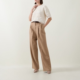 Model wearing Hugo Boss Open White textured cotton-blend top with wide-leg camel trousers and nude heeled mules.