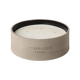 Jo Malone Lime Basil & Mandarin Outdoor Candle in a wide taupe concrete vessel with four wicks and black rim
