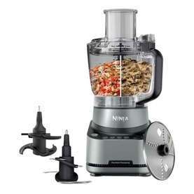 Ninja PrecisionPro Food Processor in silver with filled bowl, shown with blade and disc attachments