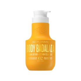 Sol de Janeiro Body Badalada Glow Lotion in amber pump bottle with gold logo detailing