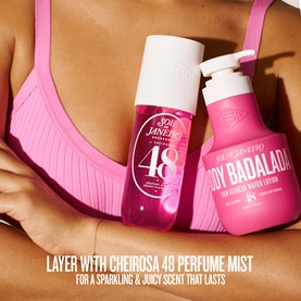 Sol De Janeiro Cheirosa 48 Perfume Mist and Body Badalada Water Lotion in pink bottles, held against model's body