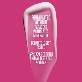 Sol De Janeiro body lotion formula callout on pink background: paraben-free, phthalate-free, mineral oil-free, dermatologist tested, PETA-certified