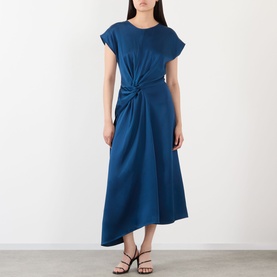 Model wearing Victoria Beckham Aria Twist Waist Dress in Dark Ocean, featuring cap sleeves, waist twist detail and asymmetric midi hem, styled with