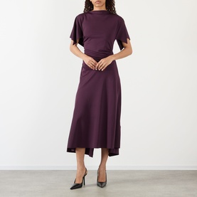 Model wearing Victoria Beckham Gathered Asymmetric Dress in Blackcurrant with gathered waist, flutter sleeves and asymmetric midi skirt, styled with