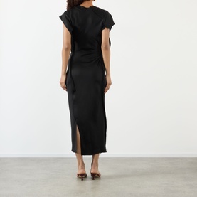 Model wearing Victoria Beckham black acetate-blend midi dress, back view, cap sleeves, side split, with brown heeled mules.