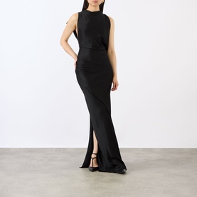 Model wearing Victoria Beckham Kyra Draped Gown in black, sleeveless maxi with draped neckline, side gathered detail and floor-sweeping hem