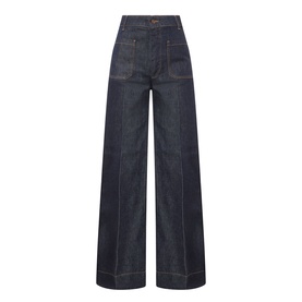 Victoria Beckham Alina High-Rise Flared Leg Jeans in indigo, wide-leg silhouette with pressed creases, patch pockets and tobacco stitching