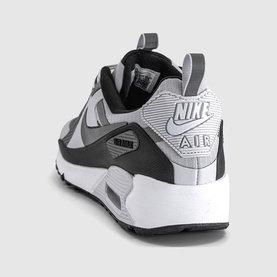 Nike Air Max trainer in Vast Grey and Pencil Point, grey mesh upper with black overlays, white midsole, black outsole, heel view.