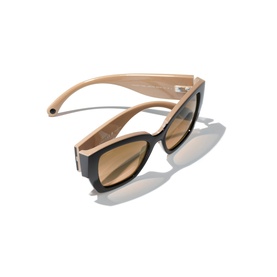 Black and beige rectangular sunglasses with wide temples and amber-tinted lenses, shown at an angle on white background