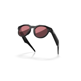 Oakley black round sunglasses with rose-tinted lenses and matte black frame, angled product view