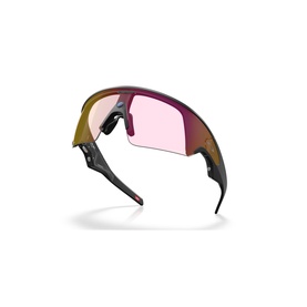 Oakley sport wrap sunglasses with dark frame, gold-toned bridge, and pink-tinted shield lens on white background