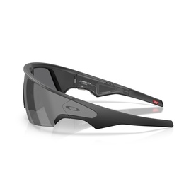 Oakley black shield-style sunglasses with matte frame, dark tinted lens, and red accent tips, shown at an angle