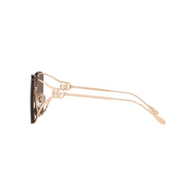 Tortoiseshell cat-eye sunglasses with rose gold metal arms featuring double-G logo detail, side profile view