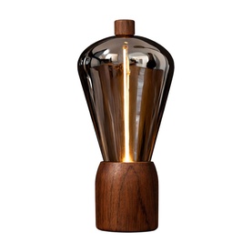 Gingko table lamp with smoked glass Edison-style bulb on a dark walnut wooden base, glowing warm amber light