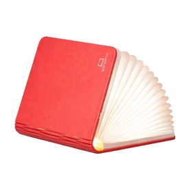 Gingko Smart Book Light in Coral Red, open to reveal warm glowing LED pages in a fabric-covered book design