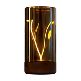 Gingko amber glass cylinder table lamp with warm LED filament glow and botanical cut-out design, illuminated on white background
