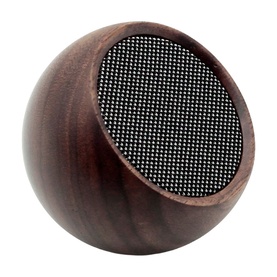 Gingko spherical portable speaker in dark walnut wood finish with circular mesh grille front