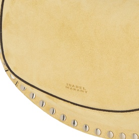 Isabel Marant straw leather crossbody bag, close-up of circular body with embossed logo and silver stud trim detail