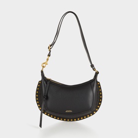 Isabel Marant black leather shoulder bag with gold-tone studded trim, zip closure, and adjustable single strap