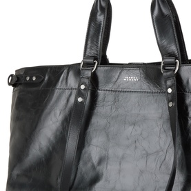 Isabel Marant black leather tote bag with silver-tone hardware, dual top handles and adjustable crossbody strap, close-up detail view