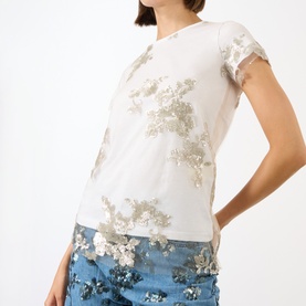Model wearing Marques Almeida Sequin Embroidered Layered T-Shirt in White Nude with gold sequin floral detailing and semi-sheer overlay, styled with