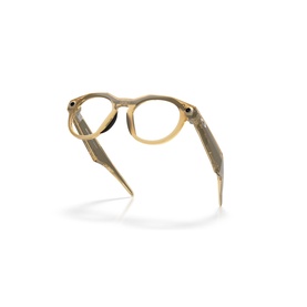 Oakley yellow round-frame glasses with textured gold arms, angled product view showing frame silhouette and hinge detail