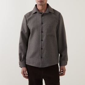Model wearing Profuomo brown wool-blend casual shirt with chest pocket and dark button placket, styled with dark trousers