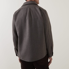 Model wearing Profuomo brown wool-blend casual shirt, shown from the back, with dark trousers visible