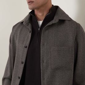 Model wearing Profuomo brown wool-blend casual shirt with button front and chest pocket, layered over black zip-up sweatshirt and white tee