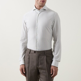 Model wearing Profuomo dark green stripe single cuff regular shirt, styled with brown tailored trousers.