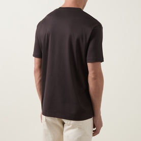 Model wearing Profuomo Solid Logo Pima T-Shirt in brown, rear view, crew neck, short sleeves, styled with stone chinos