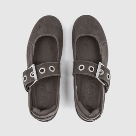 Puma matte bronze black mary jane flats, overhead view showing eyelet buckle strap and cushioned insole.