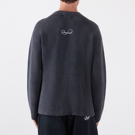 Model wearing Storefront Fisherman Script Logo Sweater in charcoal, back view showing ribbed knit texture and script logo embroidery.