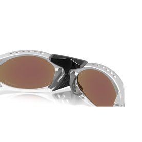 Close-up of silver wraparound sunglasses frame with black nose bridge detail and mirrored bronze lenses
