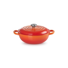 Le Creuset Volcanic cast iron shallow casserole dish with lid and side handles, in deep orange-red enamel finish