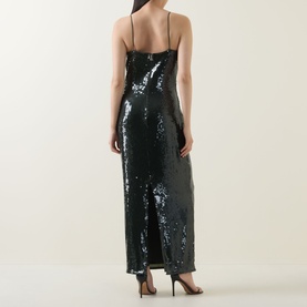 Model wearing Rotate Black Olive sequin maxi dress, spaghetti straps, back split, styled with black heels.