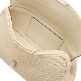 Toteme Pearl clutch bag interior view, showing cream woven exterior, silver hardware clasp, and single interior card slot pocket
