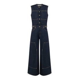 Ulla Johnson Tigris denim jumpsuit in dark indigo, sleeveless, button-front bodice, wide-leg trousers with contrast topstitching