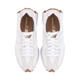 New Balance 327 trainers in white with gum rubber sole, gold NB logo, and white lace-up detail, overhead view