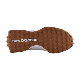 New Balance Golf womens golf shoe sole in brown, featuring textured rubber outsole with New Balance branding