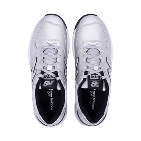 New Balance 574 trainers in silver and black, shown from above, with lace-up front, black insole, and chunky white sole