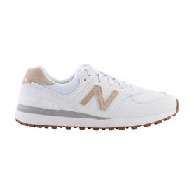 New Balance Golf 574 women's golf shoe in white with gold N logo, spikeless gum rubber sole, lace-up leather upper