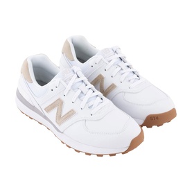 New Balance Golf women's 574 golf shoes in white with gold N logo, lace-up leather upper and gum rubber sole.