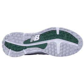 White and green New Balance trainer outsole with textured grip pattern and embossed NB logo, shown from below.