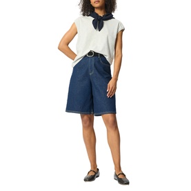 Model wearing Whistles grey sleeveless top with navy neck tie, styled with dark denim belted shorts and flat shoes