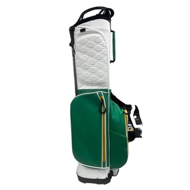 FastFold stand golf bag in white and green with gold zip detail, hexagonal texture panel and carry strap
