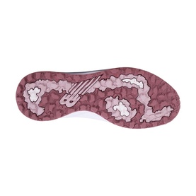 New Balance Golf women's golf shoe in sand, showing dusty pink camo-patterned rubber outsole with traction lugs.